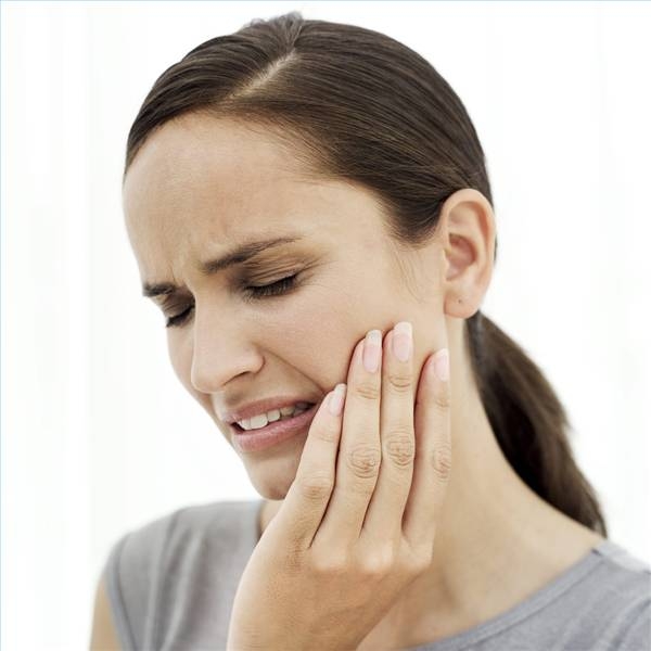 Sensitive Teeth: Causes and Remedies
